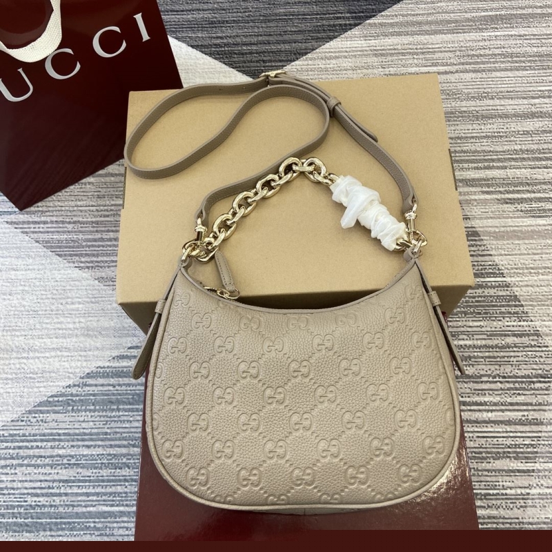 G*u*i top handle bags